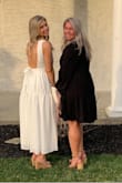 Runs a little large, I'm usually in between a small and medium but I ordered a small & it was perfect. I wore it for my rehearsal dinner & received so many compliments! Very soft & comfy. - Shelley M.