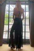 This dress is amazing, and if you are on the fence, buy it and try it on! Both the front and back are beautiful. Perfect for anything dressy in the summer. The whole skirt is sheer, but the bodysuit covers more than a swimsuit would, so it is not too revealing. Love it! - Amy H.