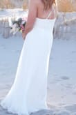 This dress was absolutely perfect for my beach wedding. It did come pretty long and needed to be hemmed, I am 5'5" and had to take off a good 5" from the bottom. Besides that the dress was beautiful. - Kelly D.