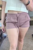 But not in these shorts. Loved the color and the material. Even the waistband fit perfectly and was super comfortable...but the material was SO tight at my thighs. - Ashley S.