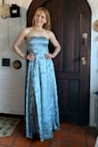 I wore it at a wedding. It was too long and I got it altered so it wouldn't touch the floor... but that's my personal preference. I'm 5'5 and was wearing 3 inches heels. Elegant, classy, and comfortable. - Marina B.