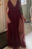 Bought this for upcoming weddings and I love it! As mentioned in other reviews it does need hemming. I love the adjustable straps snd the slits. It's fancy with a bit of sexy. - Alyssa S.