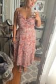 This dress is so cute! It runs a little large but it works out because the hip part doesn't hug your body. - Erin O.