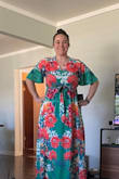 We had a last minute fundraiser that we were invited to. Attire/theme was tropical and I am so happy I found Lulus. I am a first time customer and the dress fit perfectly. I received so many compliments on this dress and it was the perfect dress for the evening. I did have to add a safety pin to the bust area just so it was more conservative but otherwise it is perfect. It does run pretty long but once you had heels or wedges the length was perfect. Quick delivery. And will order again. I would love the orange version of this dress as well. - Katherine W.