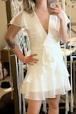 The tops I super loose on my chest, hanging out freely. The skirt is super short. This dress would have been nice if it fit properly on me. - Angelica R.