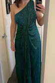 I'm in love with this dress! Such a fun color and design. It was a little big at the waist and chest for me so I had a tailor bring it in a bit. Other than that, I'd definitely recommend this dress! - Rachel S.
