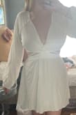Love! I bought this to wear for my college graduation coming up and it's super cute. It came wrinkly but I steamed it and she's good as new - Natalie E.
