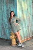 Such a great dress!  I bought a small worried it would be too tight, but it fit. The sleeves were long enough and the dress length was perfect on me. - Amanda U.