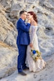 This dress was perfect for my desert wedding. I adjusted the sleeves at the top a bit but only so that I wouldn't have to worry about it sliding down. - Cristen F.