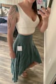 Thick material to where I don't need a bra which is awesome. Sturdy material but still very comfortable. Hugs the curves and flatters perfectly. - Sarah G.