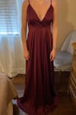 I ordered this as a bridesmaids dress for my brother's wedding. The color and material of the dress were beautiful. When I tried it on, it was super long. It is also a very low cut in the front. Even my strapless bra showed. You would have to wear stick-ons or get it altered to fit better. This dress would be great for someone who is 6" taller than me. Overall I would say that this is not the dress for me. The cost to alter the dress wouldn't even be worth it! - Lindsay K.