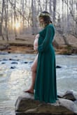 I got this for my maternity shoot and it was SO perfect and fit my vision exactly. The photos turned out BEAUTIFUL. The material is very soft and comfortable but heavy enough to flow really nicely.
I was about 150 pre-pregnancy and am closer to 175/180 now at 38 weeks, I wanted a dress I can still wear after having the baby, and being a wrap it was perfect for that, plenty of space for the bump but will close right up later. I normally get mediums from Lulus but got a large for the belly and it was perfect. - Katie B.