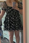 This dress looks exactly like the picture and is very flattering. The only downside is that the zipper gets stuck and is impossible to zip by myself. I've noticed this with a lot of Lulu dresses, unfortunately. Otherwise, it's beautiful. - Maia P.