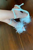 Love these feather heels!  The ankle strap makes them rather easy to walk in and comfortable.  Got a lot of compliments.  They were perfect for my bridal shower. - Kelly R.
