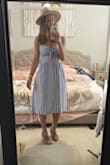 But the bottom is kinda frumpy. I think the pockets push it out at the hips. It's cuter when your hands are inside the pocket. - Elisha M.