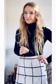 Great fit. Great material. While wearing this skirt I was approached for a job. I always feel professional and well out together in this skirt. I was worried an XS would be tight but it fit well even after gaining 10 pounds. This will be in my wardrobe forever! - Shelly M.
