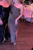 This fits great and accentuates in the right places. The material itself is stretchy, but it still looks very elegant and is double lined. - Christina G.