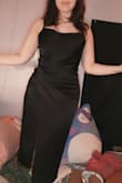 I got this in a large but returned it for a medium when the top was too loose and it fit beautifully. Got it for my college graduation photos (haven't taken them yet) but did get a photo of the try on of the medium. It feels so nice and is very flattering - Macheala R.