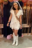 I wore this dress during my bachelorette party and it was perfect. The fabric is light and easy to dance in all night.
My only issue was the top was a bit loose when seated but a little double sided tape did just the trick to avoid a slip. - Kristina K.