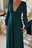 Fit beautifully in all the right places. Was worried about the back but it was very flattering. I'm tall and the dress drags on the ground. Highly recommend!! - Heather E.