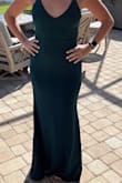Fit like a glove. I'm tall and dress reached the ground without shoes. Went with another dress but highly recommend. Very comfortable. - Heather E.
