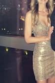 This dress is beautiful! The pictures do not do it justice. Color is amazing and it fits perfectly. The length was just right on my 5'7 frame. Sexy and classy. Perfect for my Vegas trip! - Sarah M.