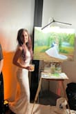 I wore this dress at my wedding after I changed out of my wedding dress I wore for the ceremony and beginning of the reception. This dress "wow'd" everyone. It is super body contouring and flattering. The slit comes up pretty high and is very sexy. I am 5'5"/5'6" and ended up wearing sandals with it. It came to the top of my feet. So it is not super long. - Danielle W.