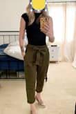 These didn't look the way they looked like on the model...much looser.  But I love them!

I wore them to a work event with a black bodysuit underneath and I was really comfortable. I felt stylish but not like I was 'giving away the goods'. - Melody A.
