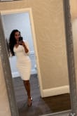 I bought an xs and med thinking that it really should be the small for me but the xs fit perfect!! Very thick material that doesn't show anything. I was very happy with this dress for a work event but I will also wear it Out to dinner. - Navneet S.