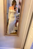 I loved how this dress fit and looked in pictures. I got so many compliments. The only issue was I had to keep pulling it up with movement. Overall, loved it though. - Gina M.