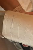 I got these in white and they arrived with blue lines drawn all over them. What kind of quality assurance didn't catch this?? They were really cute, but it makes me afraid to ever order from lulus again. - Katie W.