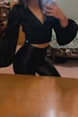 Such a cute top, and perfect for a night out! Hard to find a bra to wear underneath so I just don't wear one! Love it for smaller chest sizes - Madelyn B.