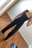 Fits a little small in the top area, so I struggled a little bit to get it over my butt/hips, but once it was on it was super flattering - I think it would be a little too baggy below if I sized up. The length is perfect for a taller person! - Jessica M.