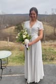 The dress is beautiful and looks exactly like the photos. I wish the bust area was a little tighter (my boobs are not tiny and I had to wear a push up bra to fill it in). I wore sandals with it and it was a perfect length but if I was any shorter I would have had to hem it or wear heals. I may have tried sizing down and been happy. - Marina K.
