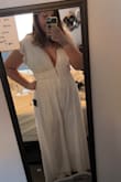I bought this for my engagement party and engagement photos! I loved how this made me feel so pretty. I was worried about the cut with my large chest but it fits perfectly! It was a little tight but only because it's a little short in the torso. The butt and thighs are a tiny bit snug but I wouldn't return for the next size up. - Tana B.