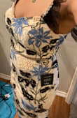 I was worried about sizing, I chose Small because the Med was sold out. I'm usually an 8 in dress size. The dress moves with your body. This fit comfortably and the beaded waistline hits right above my tummy so I don't have to worry about sitting down and pudging out. The butt is a little sheer if you look closely so wear neutral underwear! You can see a panty line. - Kim J.