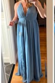 The color on the model in the photo is far more purple/lavender than what I received (see pic), but the color was still beautiful. The band at the waistline made it a little hard to zip and too snug for my comfort (but I do have a big rib cage!) Plenty long on my 5'6 frame + 3.5" heels. - Maggie C.