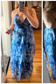 I loved the print and the model photo, but the material is a little weird - it just made me look dumpy because it doesn't lay flat. If in between sizes, size down. I am large in most Lulus dresses, and this medium fits well, especially since the straps are fully adjustable. Good length on my 5'6 frame + 3.5" heels. I wanted to love it. - Maggie C.