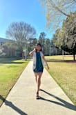 I got this dress for my graduation picture and it was everything I ever wanted and more. The color is a deep forest green that stands out! The fit was nice and snug and the open back gave the dress a sexy appeal! An overall amazing dress. I definitely recommend it :) - Mary D.