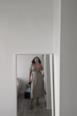 I otherwise fit a XL (so far) at Lulus but the size L fits great, the XL would be way too big. This dress has a silky feel. I wish there was a slit (will send for alterations). It is otherwise true to the picture and can easily be dressed up or down, I really like the flowery+earthy tones! It is really comfortable! Bust 42 in waist 33 in hips 44 in - Lori G.