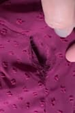 The fabric in the front was very loose,  but the dress was tight on my hips. It also came damaged with a hole in the seam. - Katie W.