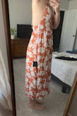 Ran large, super happy in the back. I wonder if it'd look different if I had bigger boobs? Cute pattern though - Dorothy-Faye S.