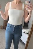 Not for tall girls&. Only because the bottom is a different mesh fabric, if your jeans aren't incredibly high waist you can see the mesh. Also the back is a different fabric from the front so it makes it a little see through which makes it a little more casual in my opinion. (Also 6" and my belly button hits exactly above the mesh bottom) - Dorothy-Faye S.