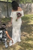 What I love about this dress is whether youre tall & thin, short & curvy (like myself) or anything in between-it looks amazing! I read every review, looked at every photo & was shocked at how beautifully it fit each bride. I took a chance as an older bride (48) & have no regrets! I felt gorgeous on my special day and my hubs absolutely loved it! - Amy W.