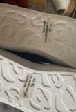 Hi there, 
I ordered an 8 in Cassay shoes and I received an 8.5. I read that you charge a $7 shipping fee. Is there any way to void that and send out the correct size and I'll return the wrong size? 

Thank you - Emily B.