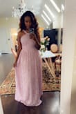 Beautiful dress wore it to a wedding and got a lot of compliments. The dress is nicely made and has a slip as well. A lil long for my height but may alter it later. - Jessica S.