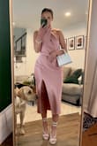 Just bought this for a wedding and it's probably my most favorite purchase from Lulus. I would definitely size down. I'm usually a medium so I ordered a S & M after reading reviews..but the small fit perfectly. The dress feels a lot more expensive than it is. Also so comfy. Doesn't really wrinkle when you're sitting. I got compliments on this dress all night and I will definitely be wearing it again. Idc if I'm an outfit repeater!!! - Jen T.