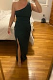 Love this dress! I wore a size medium and it fit true to size. I did have to get it hemmed tho. I'm 5,2 and it was too long. The picture is before getting it hemmed. - Megan L.