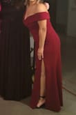 I absolutely loved this dress! The red is a nice burgundy that isn't too bright or too dark. The slit adds a nice touch and does not make the dress "too sexy" for a formal event.
Beware sizing if you have a larger chest. I am a medium in everything, but a medium would not zip up over my chest. I am a 36D-36DD. I had to order a large, which fit and had great support. Lulus has an easy return/exchange process, so I had no issue buying multiple sizes.
Photo Note: I'm only 5'1 so I got the dress hemmed to wear with ~4-inch heels. The dress was not altered in any other way. - Andrea M.