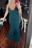 This dress is SO flattering, the PERFECT color green, and fits snug in all the right places. I was worried that the stomach would be too tight, but the material is thick and stretchy so it hides a lot. With adjustable straps, you can alter the chest to look however you want. I am shorter, so I had to get this one altered but it was so close to fitting with heels on. The hemming on the back train was slightly messed up, but I needed to get it altered anyway. 
If you are thinking about getting this dress try it!! Returning on this website was very easy.
(Size 8/10 pants) - Willa L.
